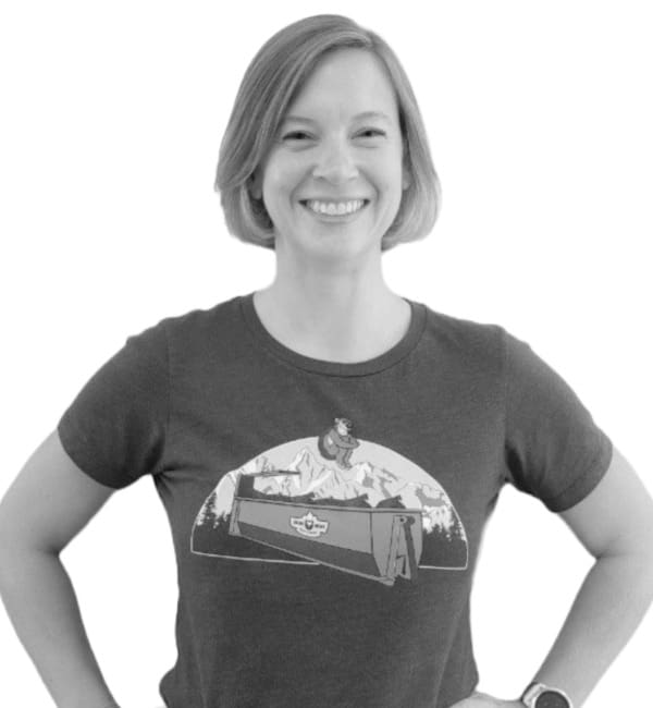 A woman wearing a t-shirt with an image of a man on it.